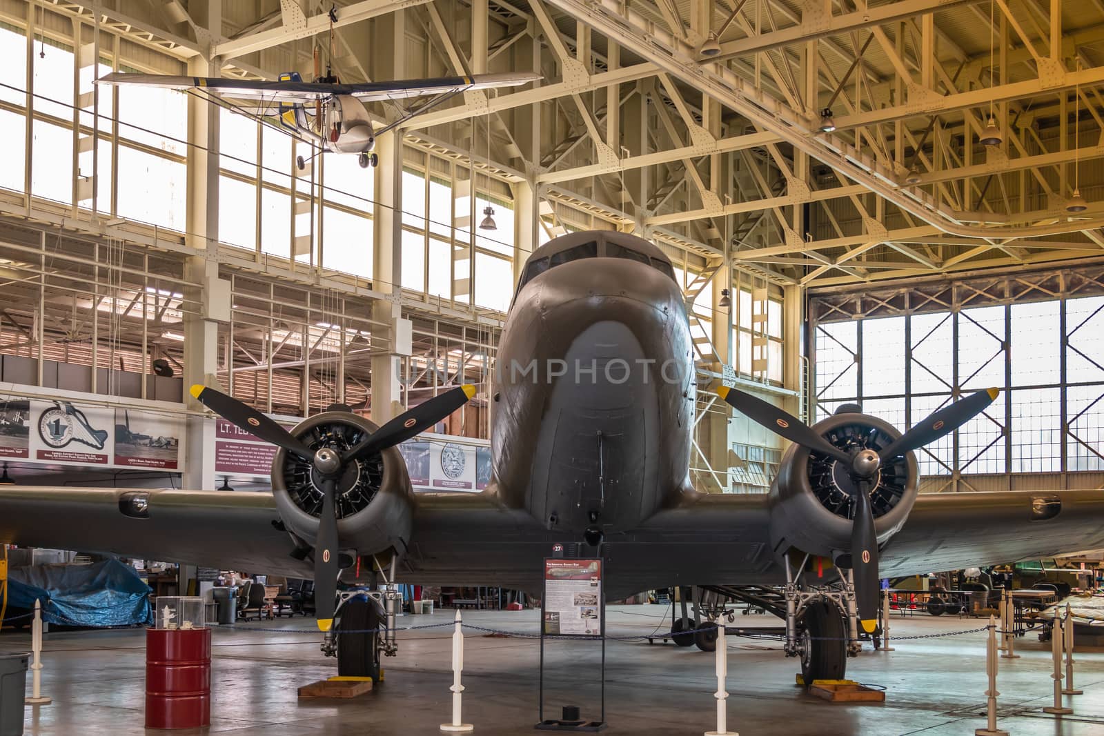 Douglas DC-3/C-47 in hangar of Pearl Harbor Aviation Museum, Oah by Claudine