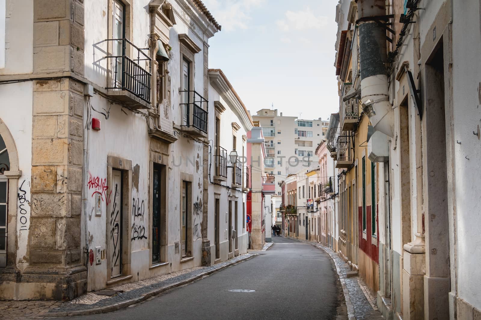 Faro, Portugal - May 1, 2018: Detail of architecture of the streets of the city center with typical construction on a spring day