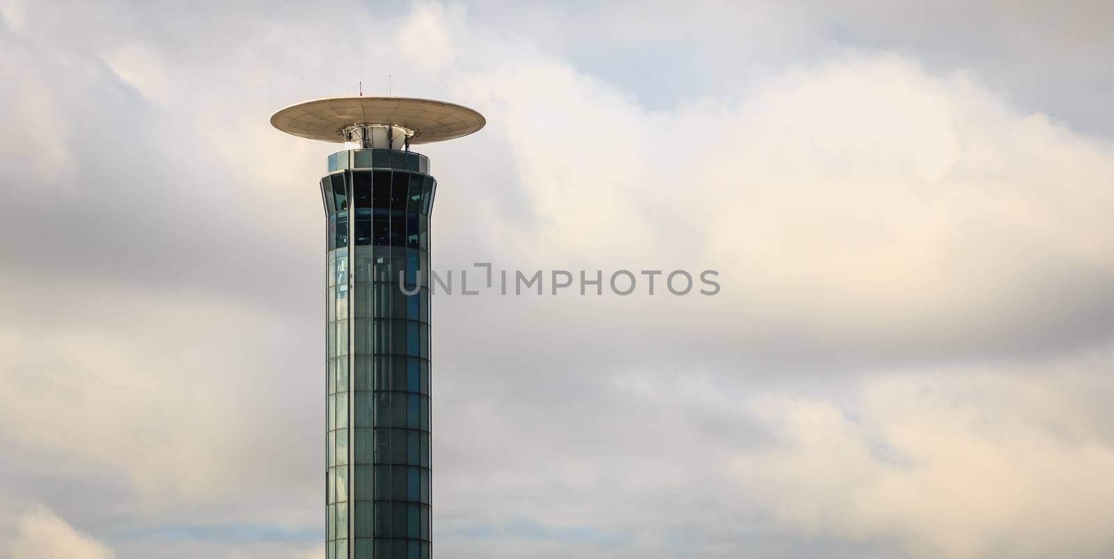Roissy near Paris, France - October 08, 2017 : exterior view of the Airport traffic control tower south of Roissy Charles De Gaulle airport on a fall day