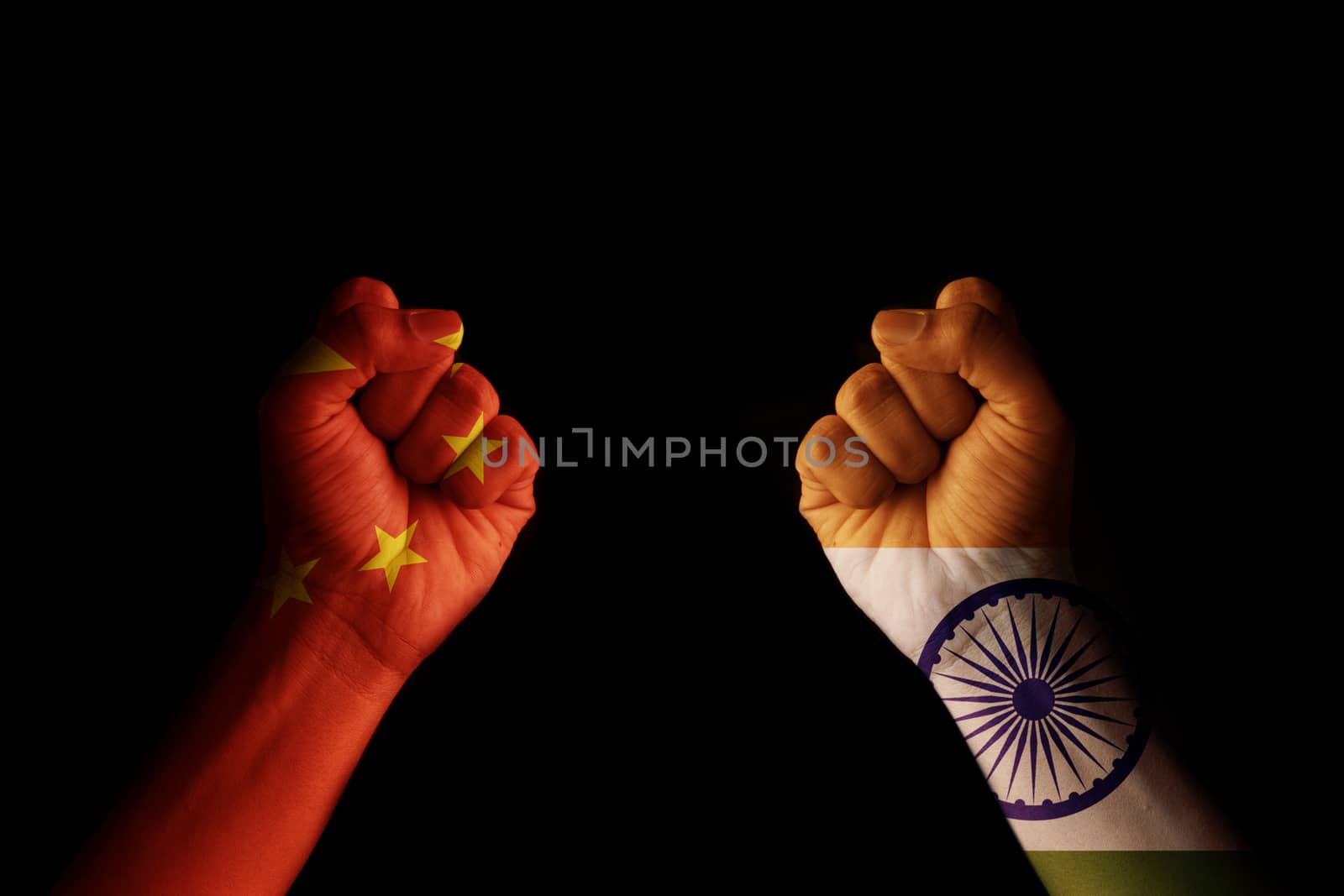 Concept of Dispute or conflict between India and China showing with fist hands. by lakshmiprasad.maski@gmai.com