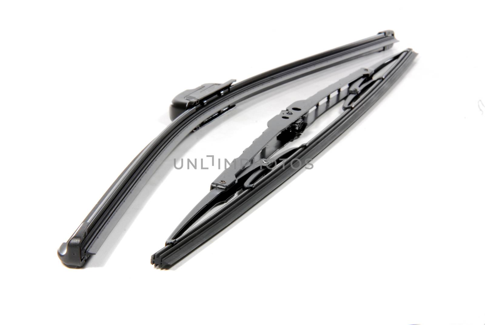 automotive windshield wipers one new style and one old style