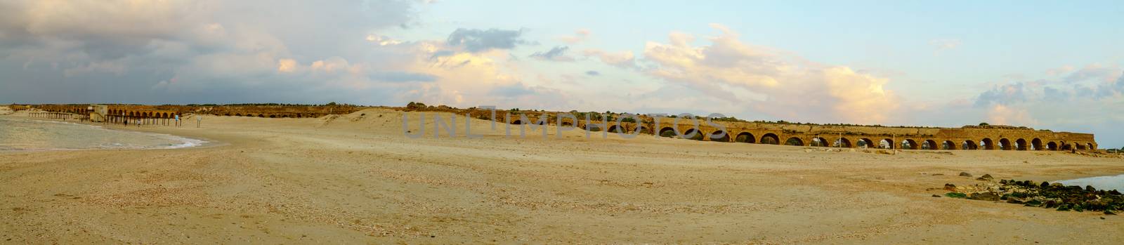 Panoramic sunset view of the beach and Roman Aqueduct, Caesarea by RnDmS
