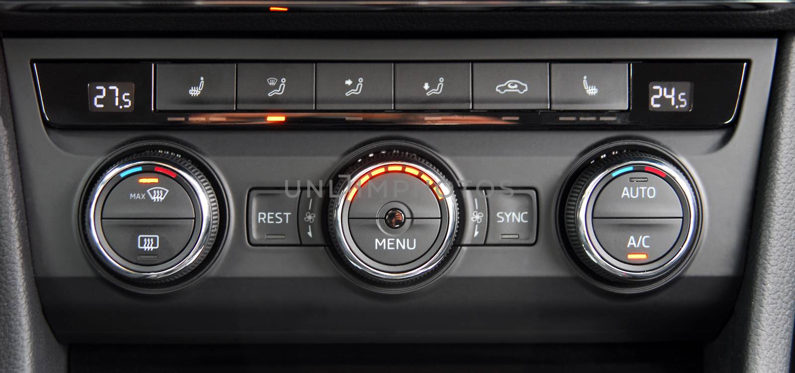 manual switches the air conditioning on the dashboard of the car