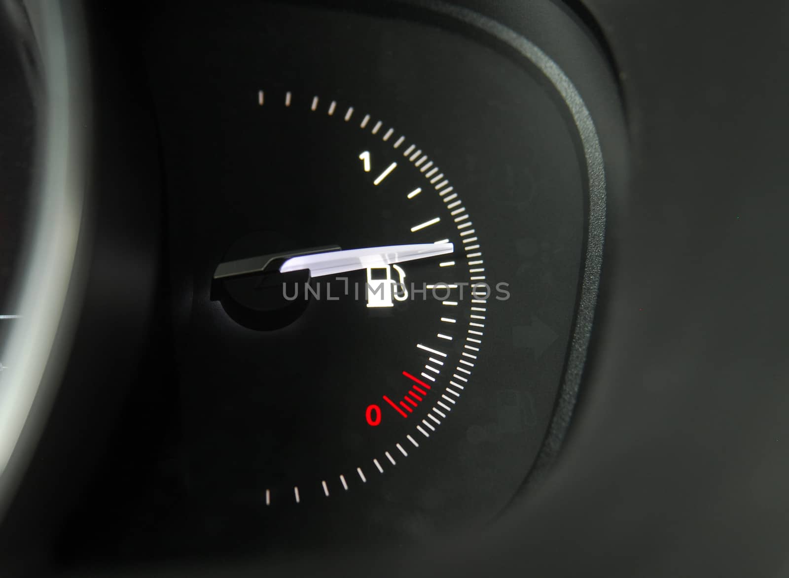 Close-up shot of a fuel gauge in a car