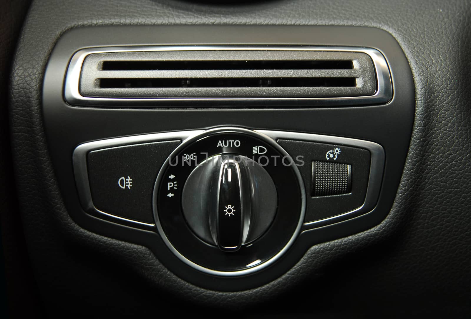 Closeup image of car lighting control switch
