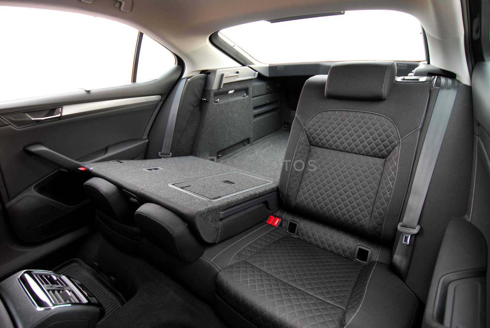 passenger car trunk with rear seats folded