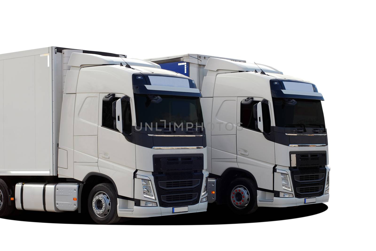 two large trucks with semi trailer on a white background