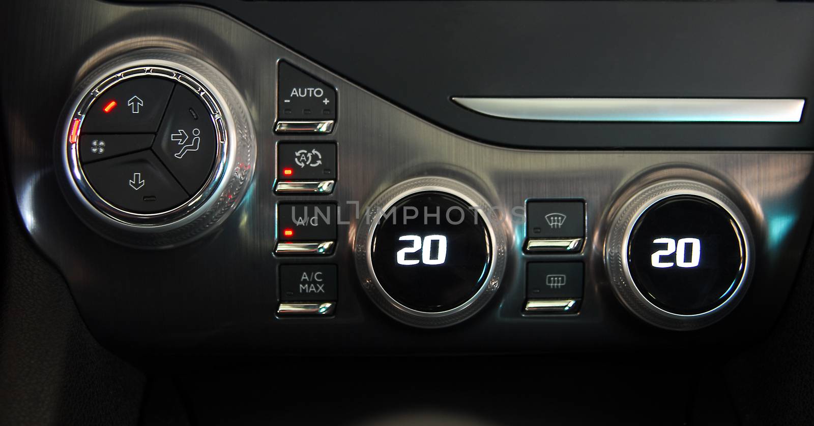 manual switches the air conditioning on the dashboard of the car