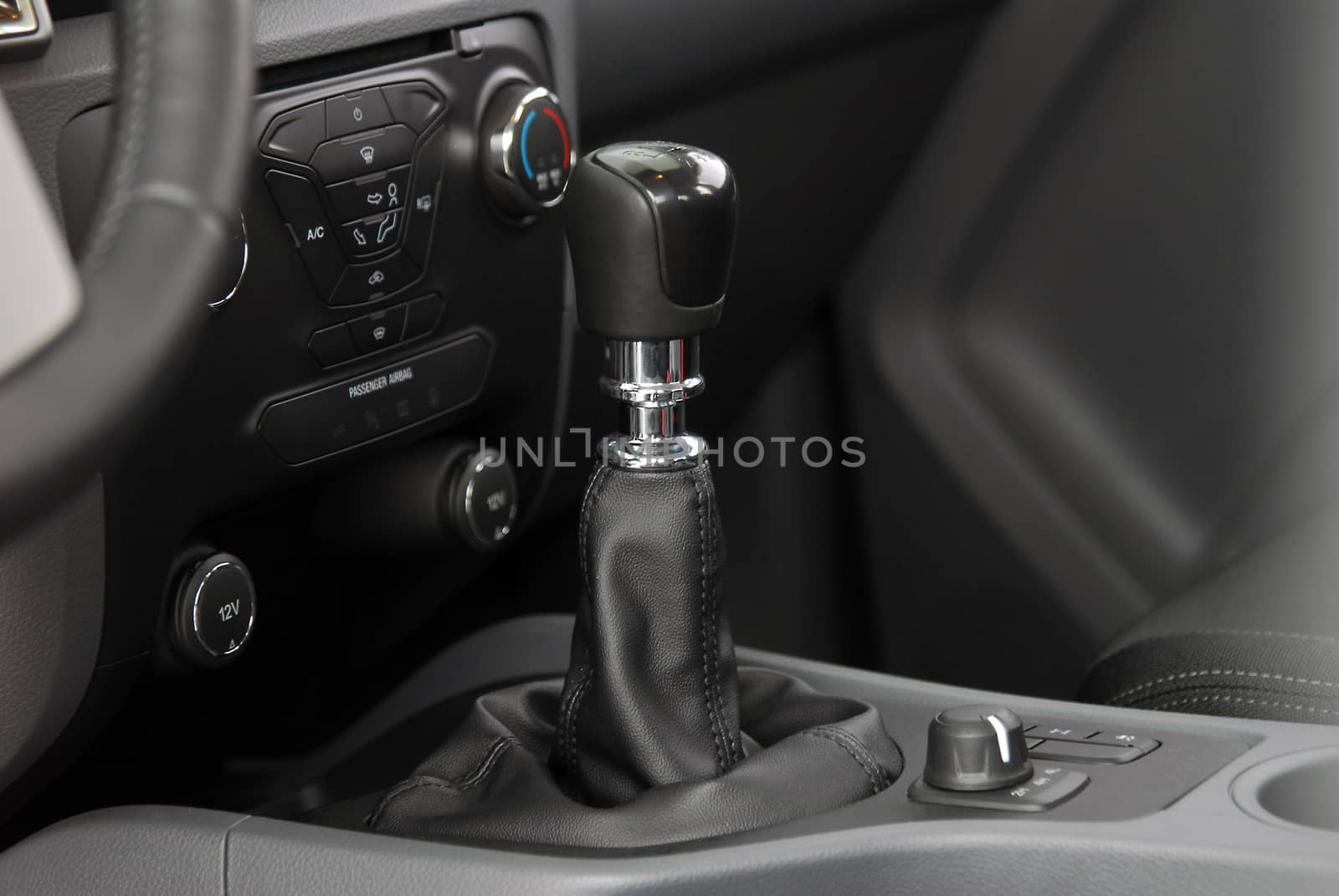 detail in the interior of the modern car, maual shift lever in the passenger car