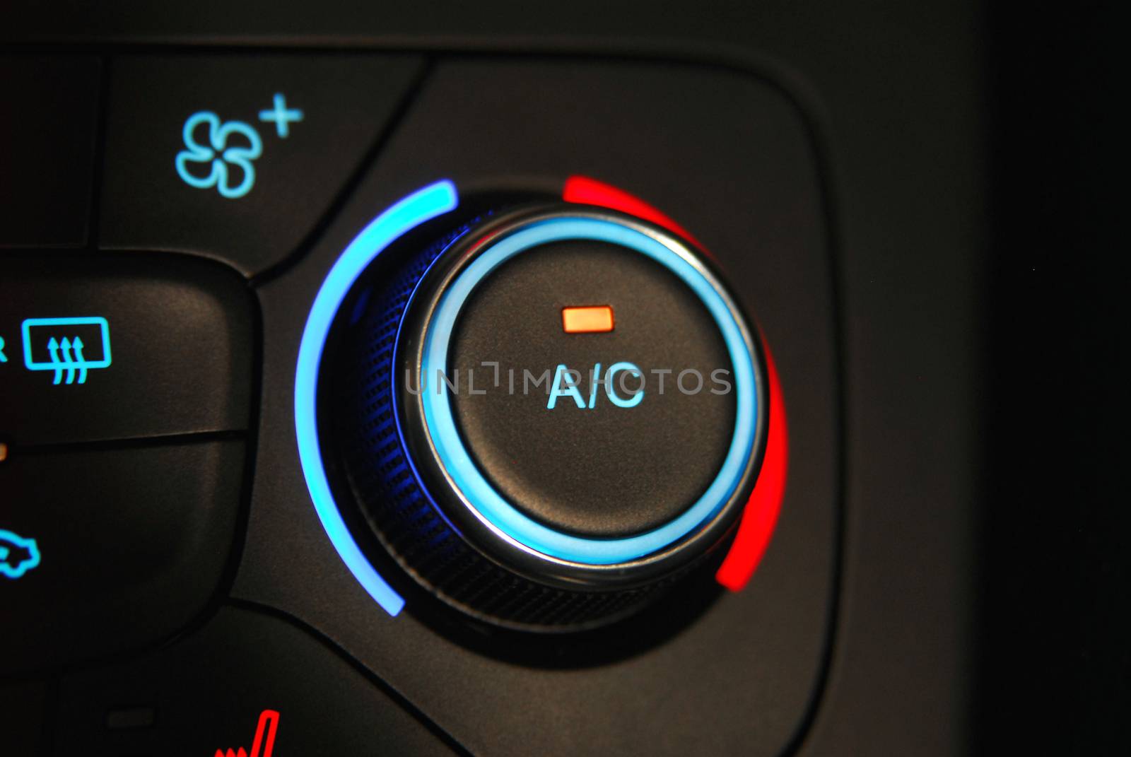 manual switches the air conditioning on the dashboard of the car