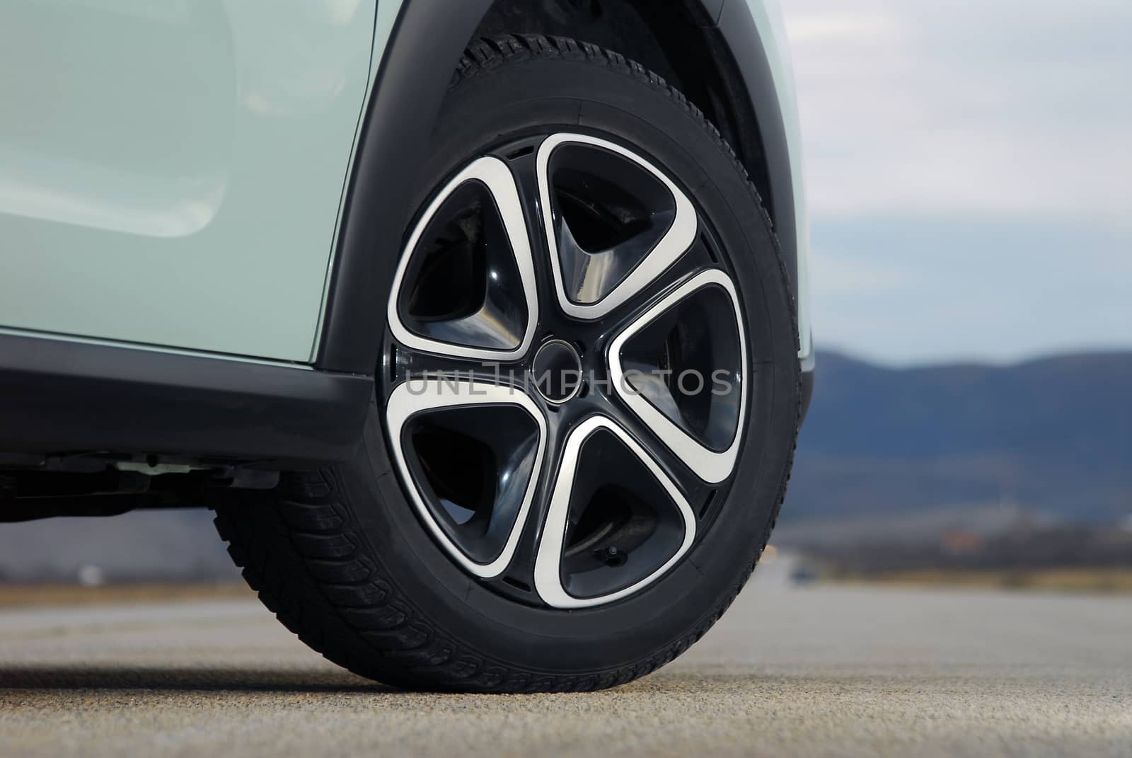 tire and alloy wheel on this small passenger car