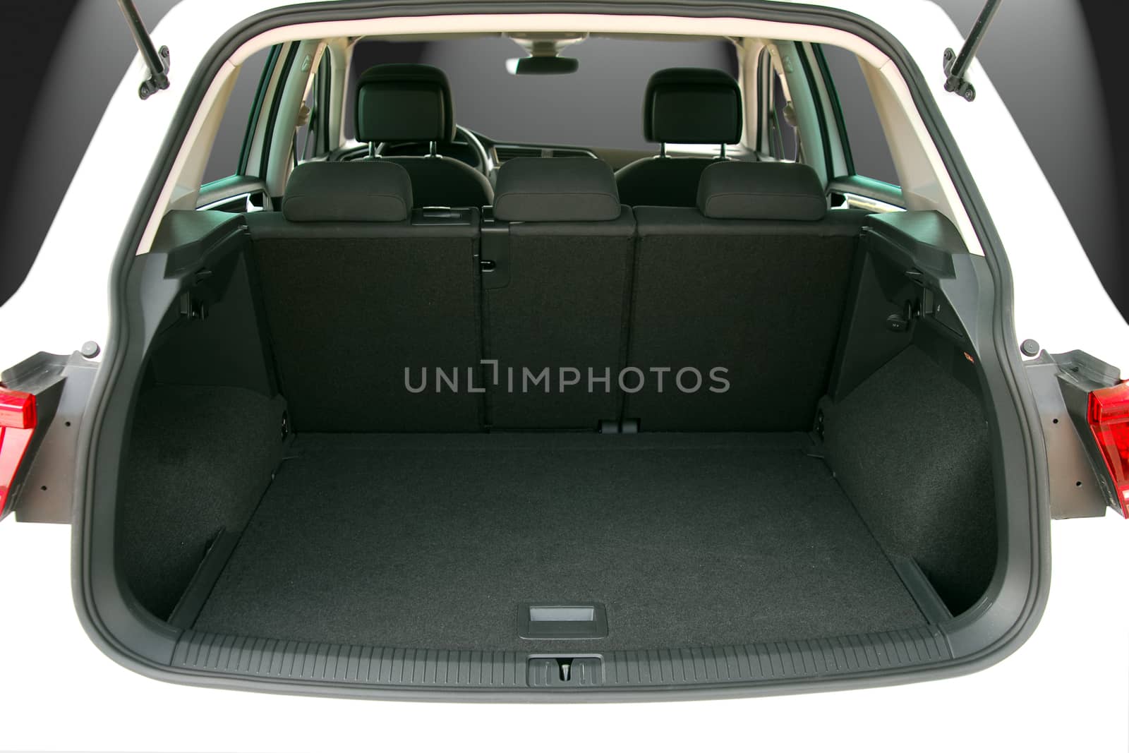 Empty trunk of the small white suv