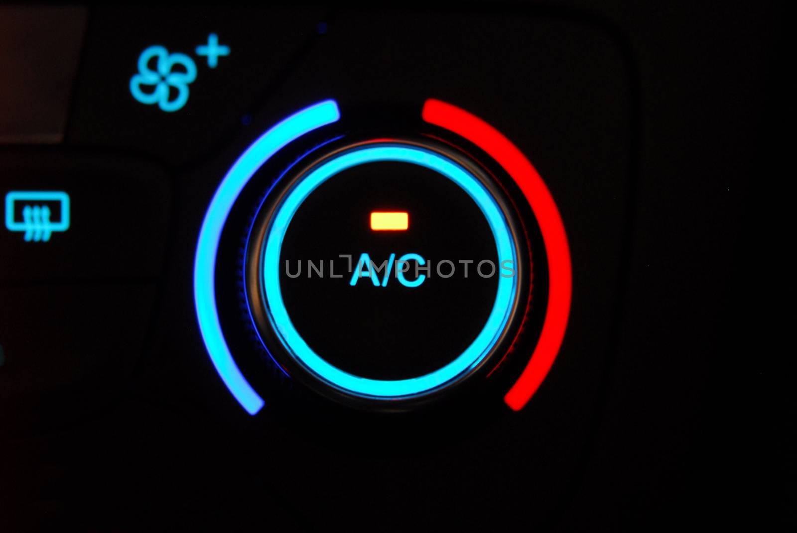manual switches the air conditioning on the dashboard of the car