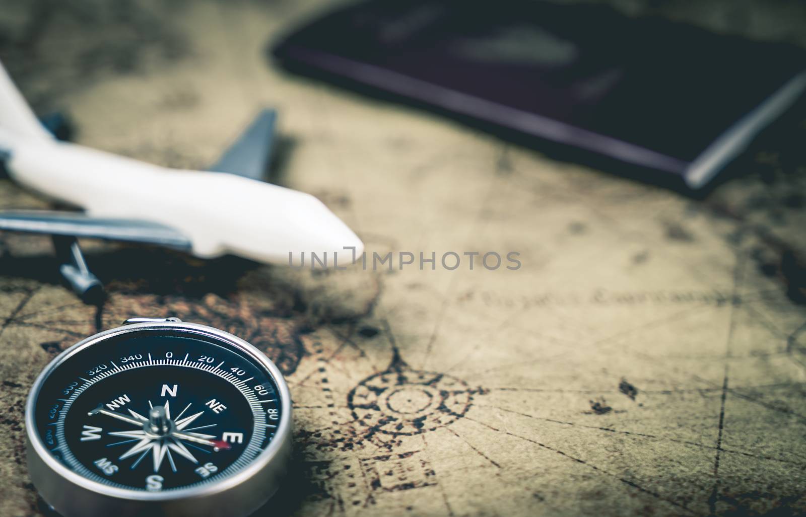 Compass and traveler equipment on vintage map by junce