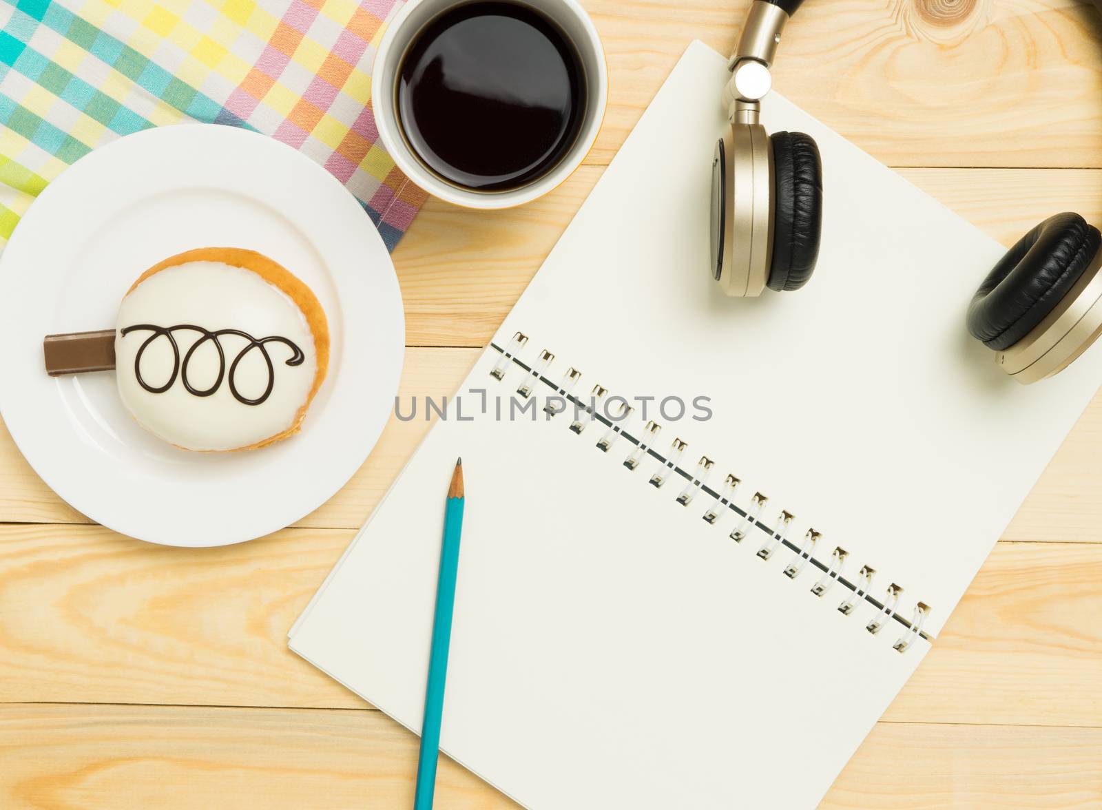 Music writing equipment on a sweet cafe table by junce