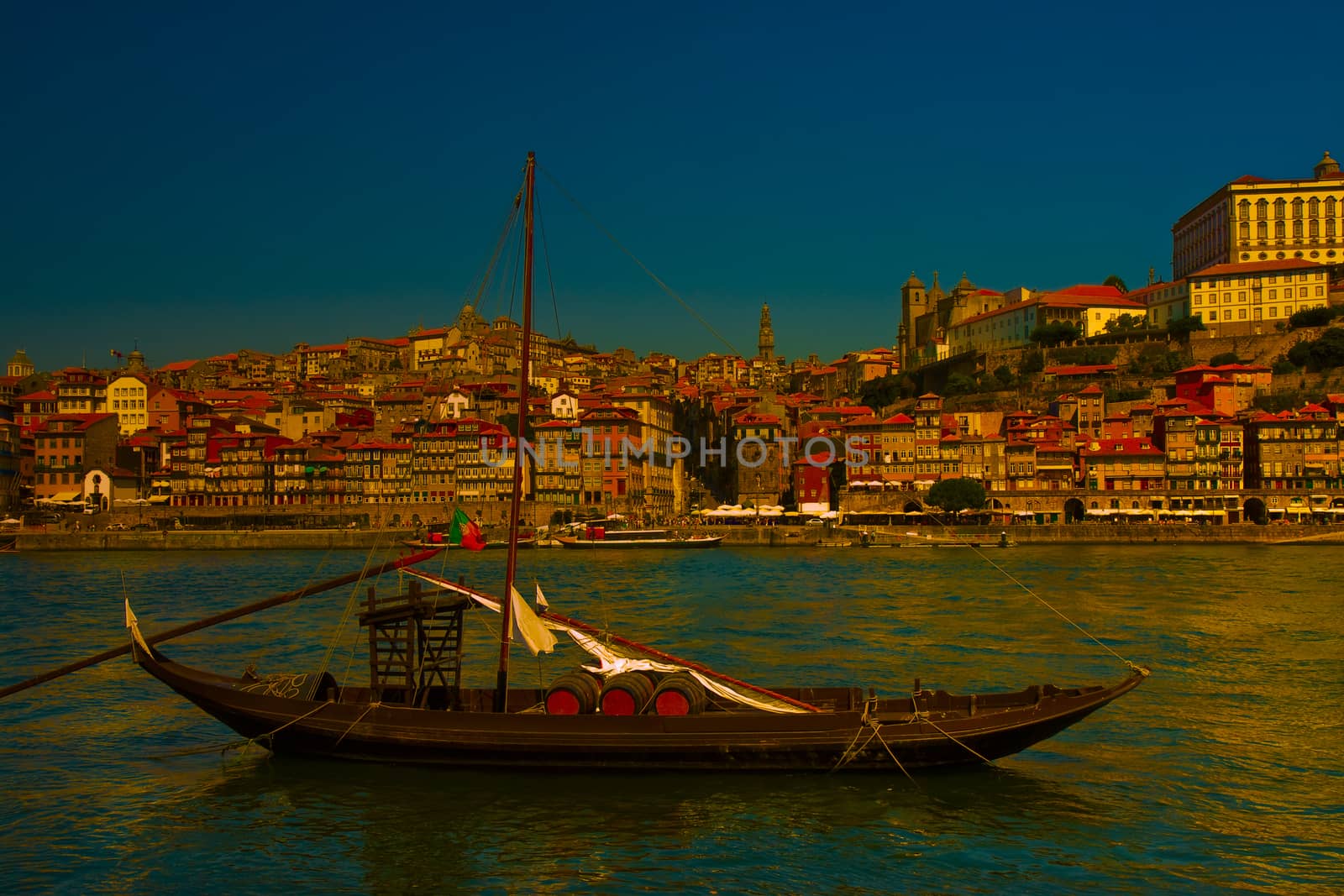 Typical portuguese wooden boats, called barcos rabelos, used in the past to transport the famous port wine (Porto-Oporto-Portugal-Europe) - dusk toned image.