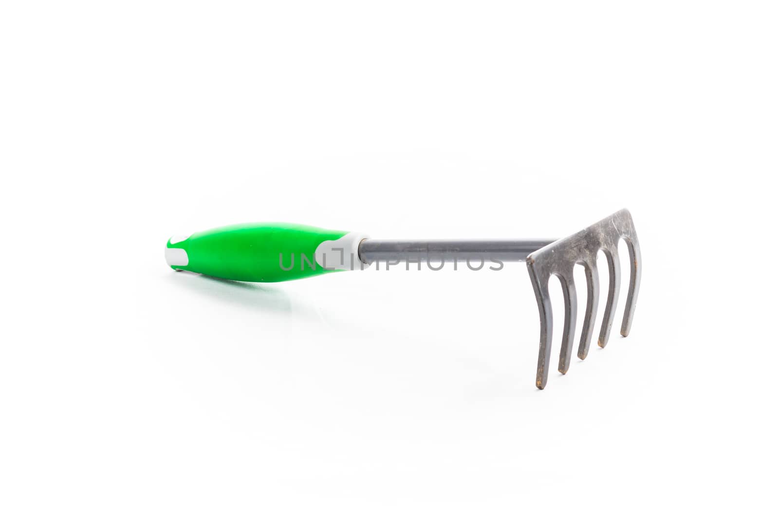 small rake gardening 5 teeth with green handle on white background