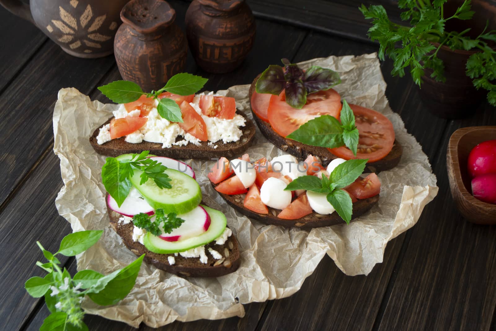 Assorted bruschetta with various toppings. Appetizing bruschetta or sandwiches. Mix
