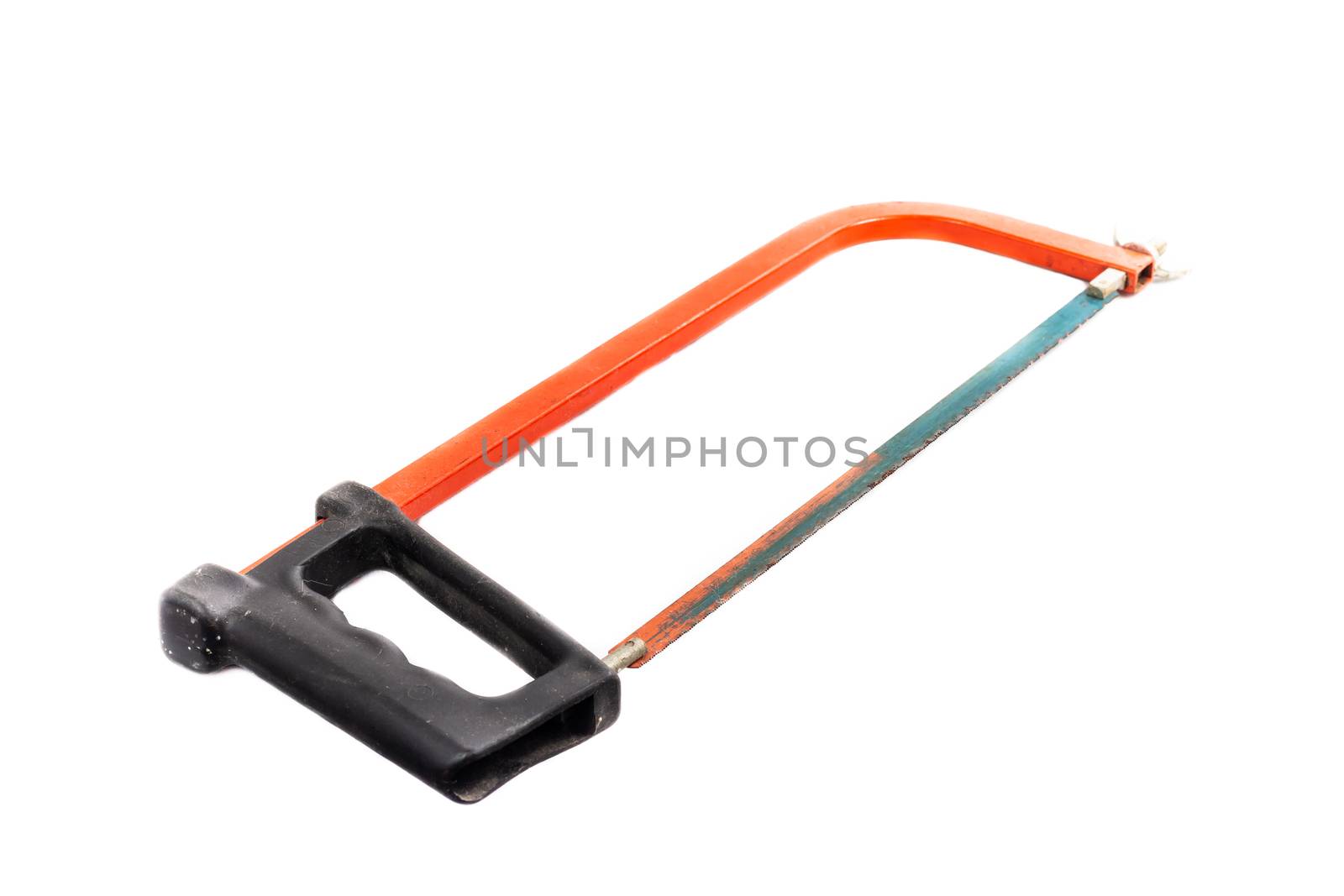 red hacksaw on a white background in studio by AtlanticEUROSTOXX