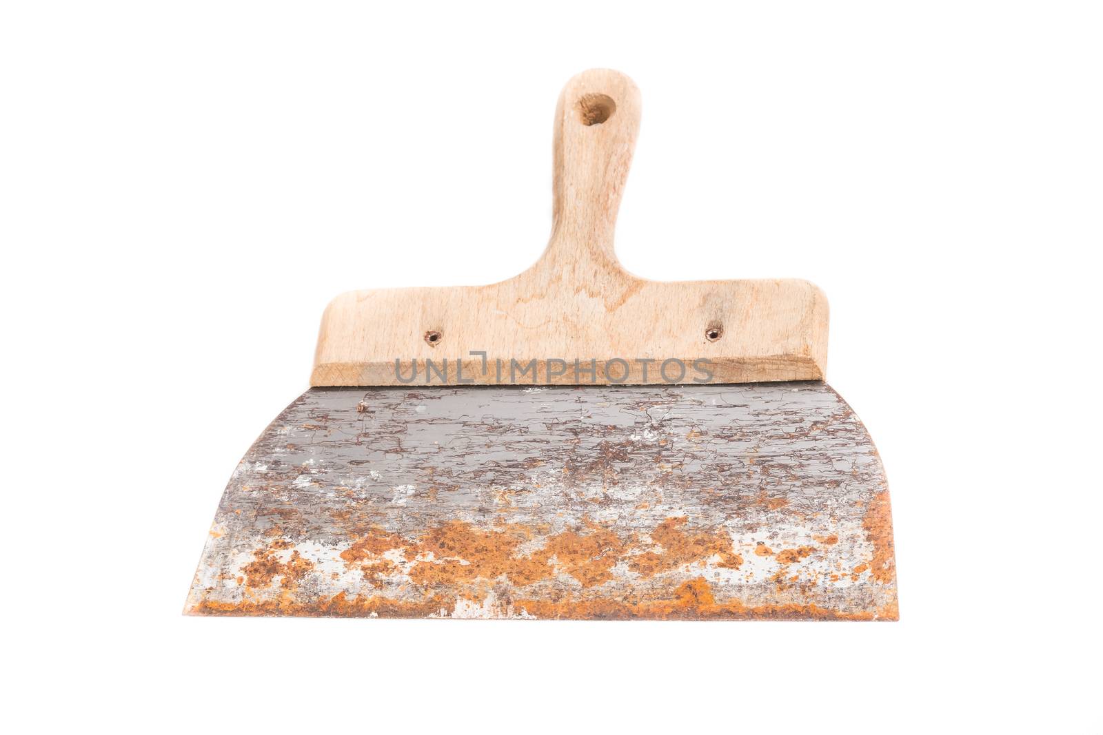 rusty spatula to coat on white background in studio