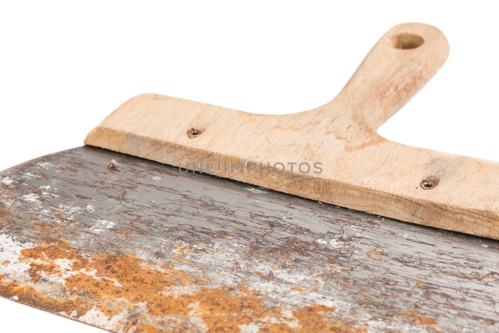 rusty spatula to coat on white background by AtlanticEUROSTOXX