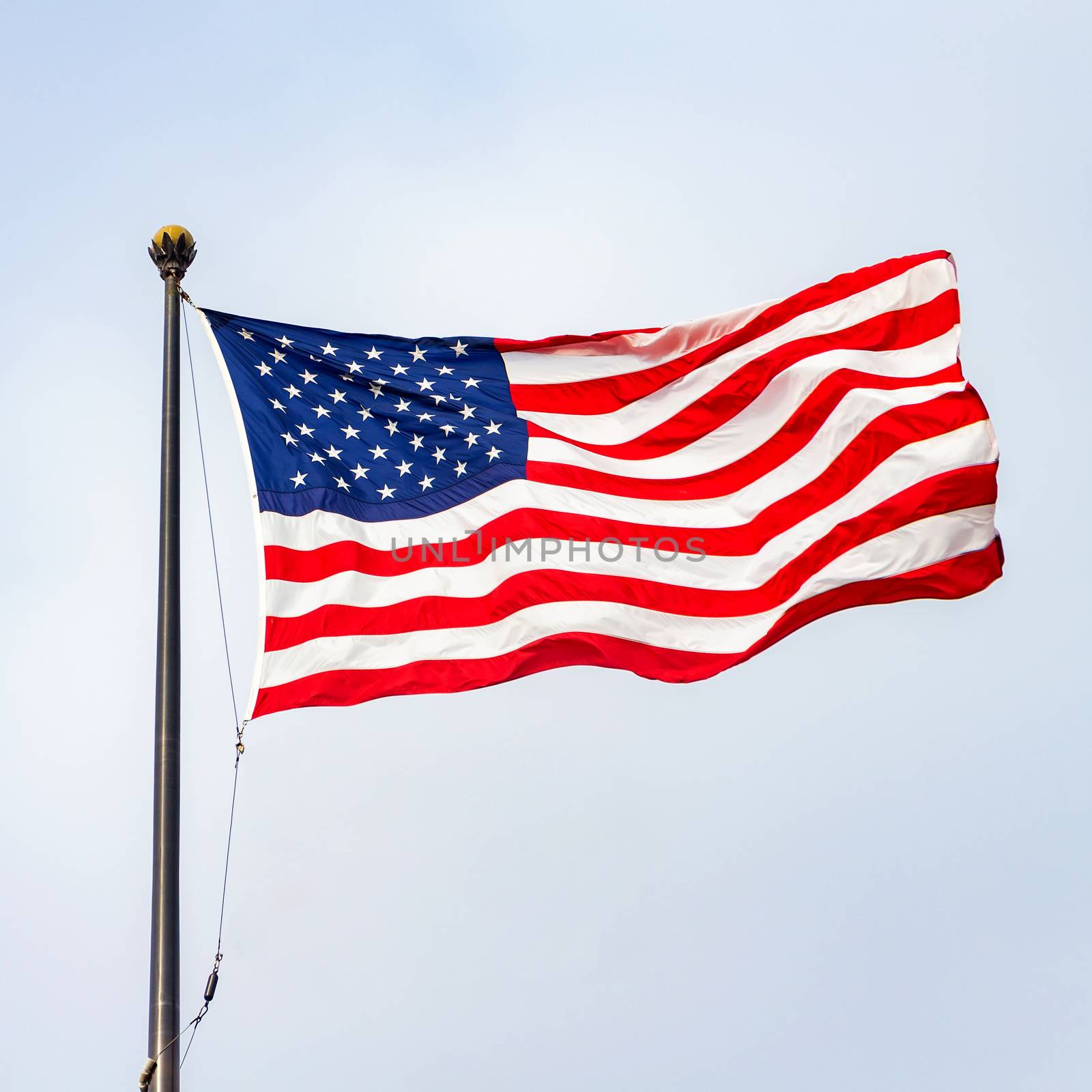 The United States of America flag on a sunny day.