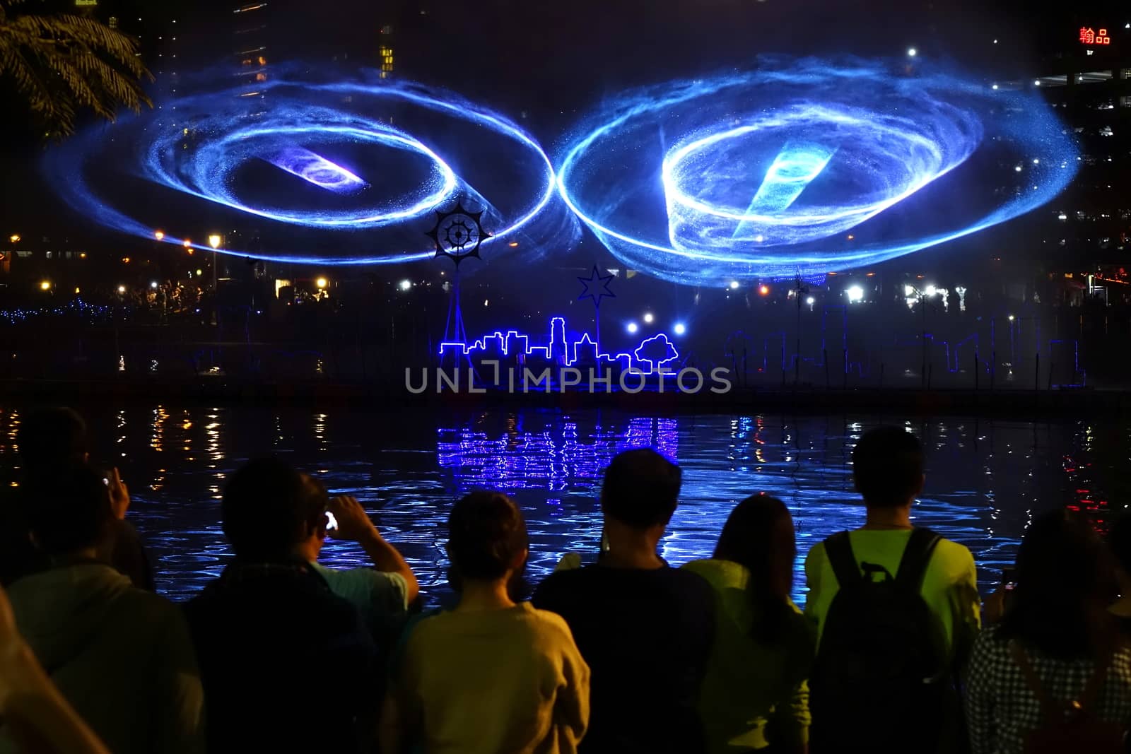 KAOHSIUNG, TAIWAN -- MARCH 2, 2018: A laser light show is on display on the Love River during the 2018 Lantern Festival to welcome the Year of the Dog.