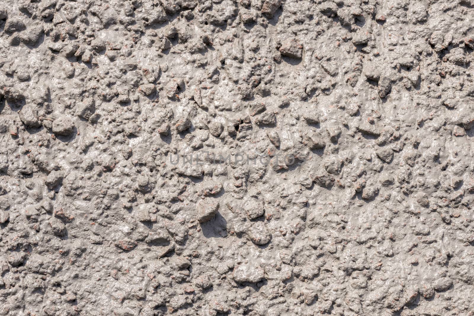 Detail of a fresh concrete surface under the sun