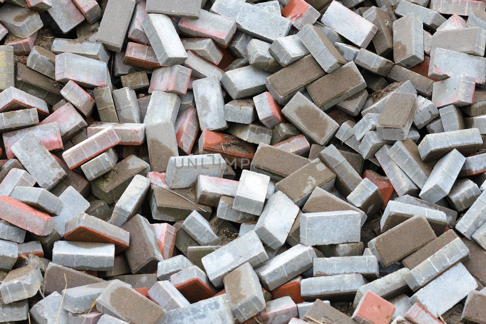 A heap of calcium silicate bricks on a construction site