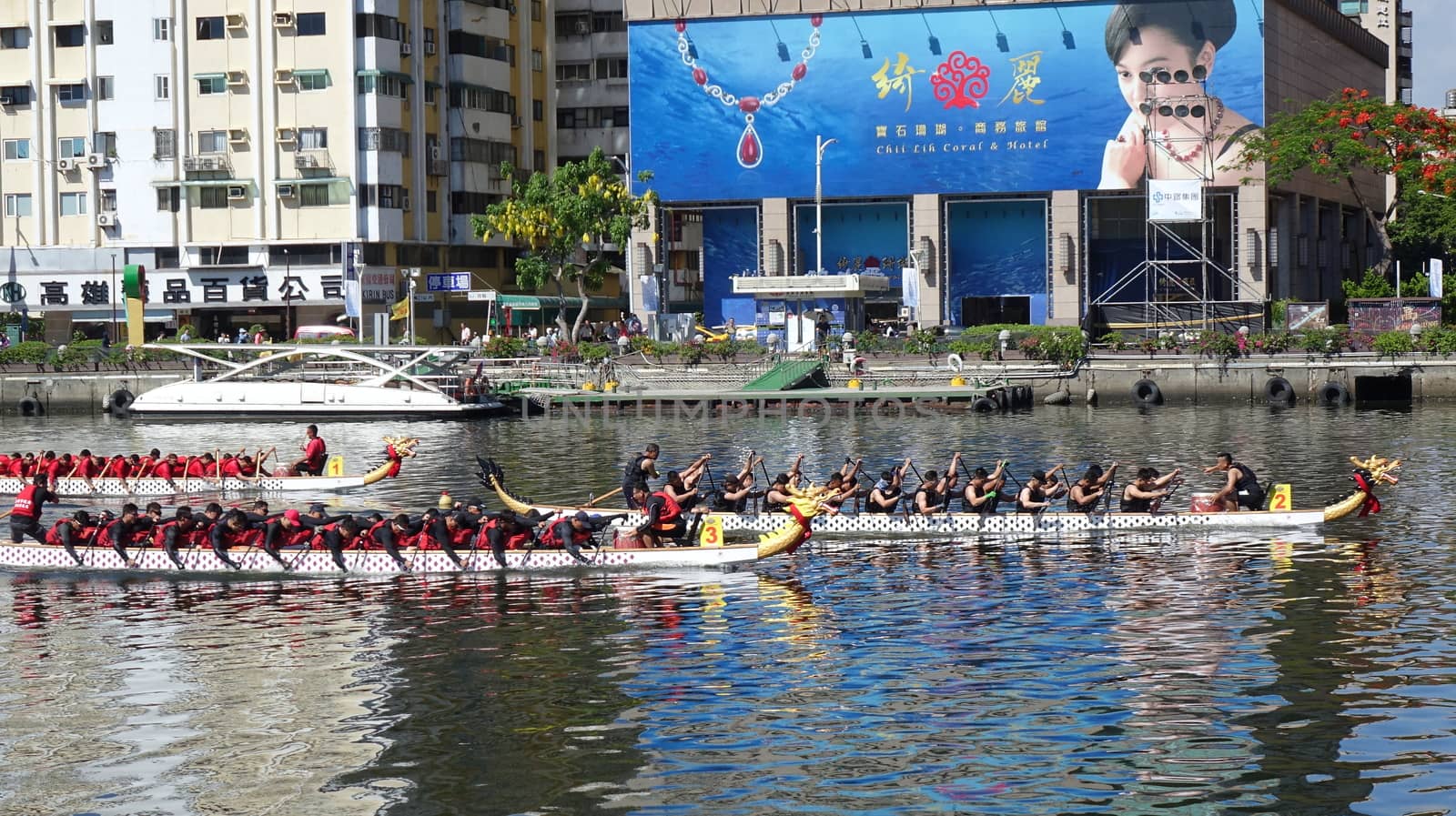 KAOHSIUNG, TAIWAN -- JUNE 7, 2019: Teams compete in the yearly  Love River dragon boat races.
