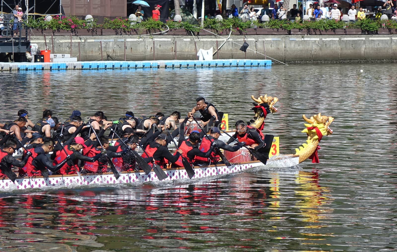KAOHSIUNG, TAIWAN -- JUNE 7, 2019: Teams compete in the yearly  Love River dragon boat races.