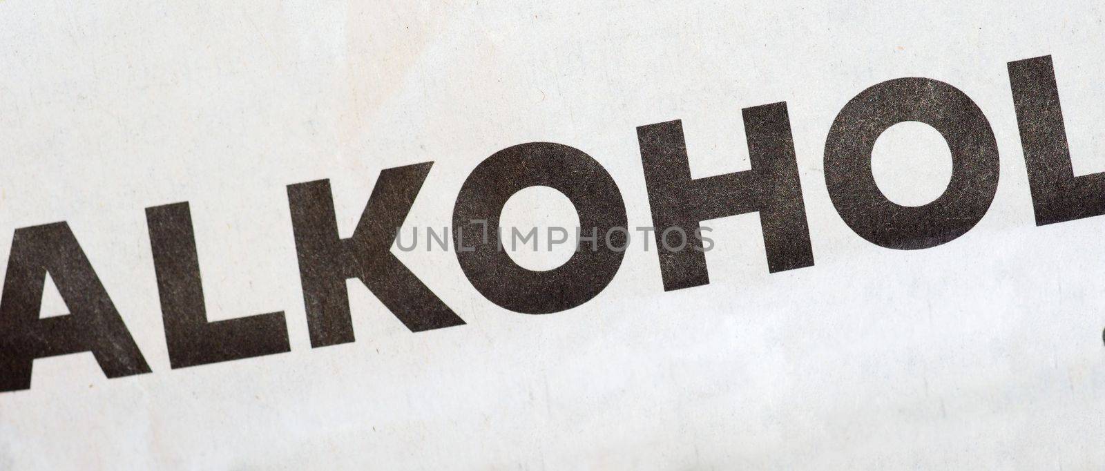 Alkohol (translation: Alcohol) printed in black on white paper