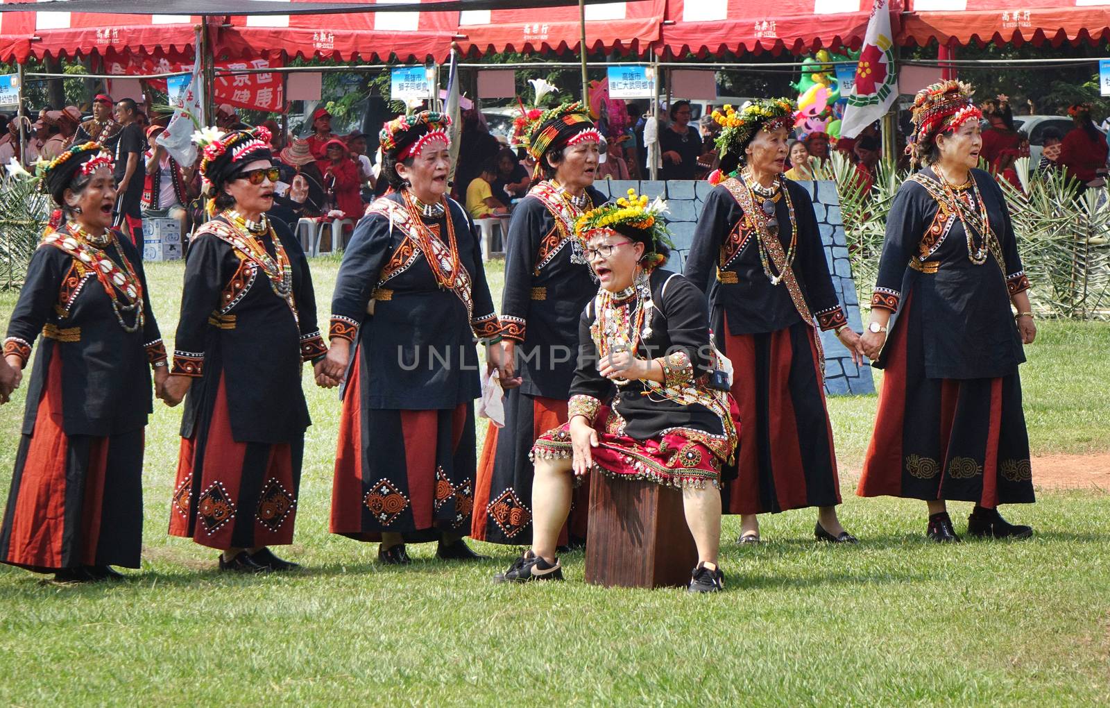 KAOHSIUNG, TAIWAN -- SEPTEMBER 28, 2019: Women of the indigenous Rukai tribe perform a dance during the traditional harvest festival.