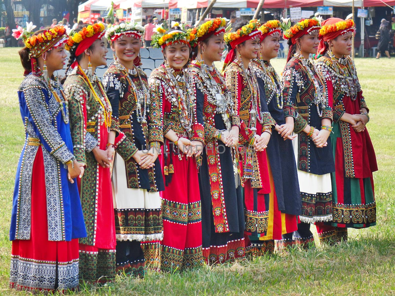 KAOHSIUNG, TAIWAN -- SEPTEMBER 28, 2019: Women of the indigenous Rukai tribe perform a dance during the traditional harvest festival.