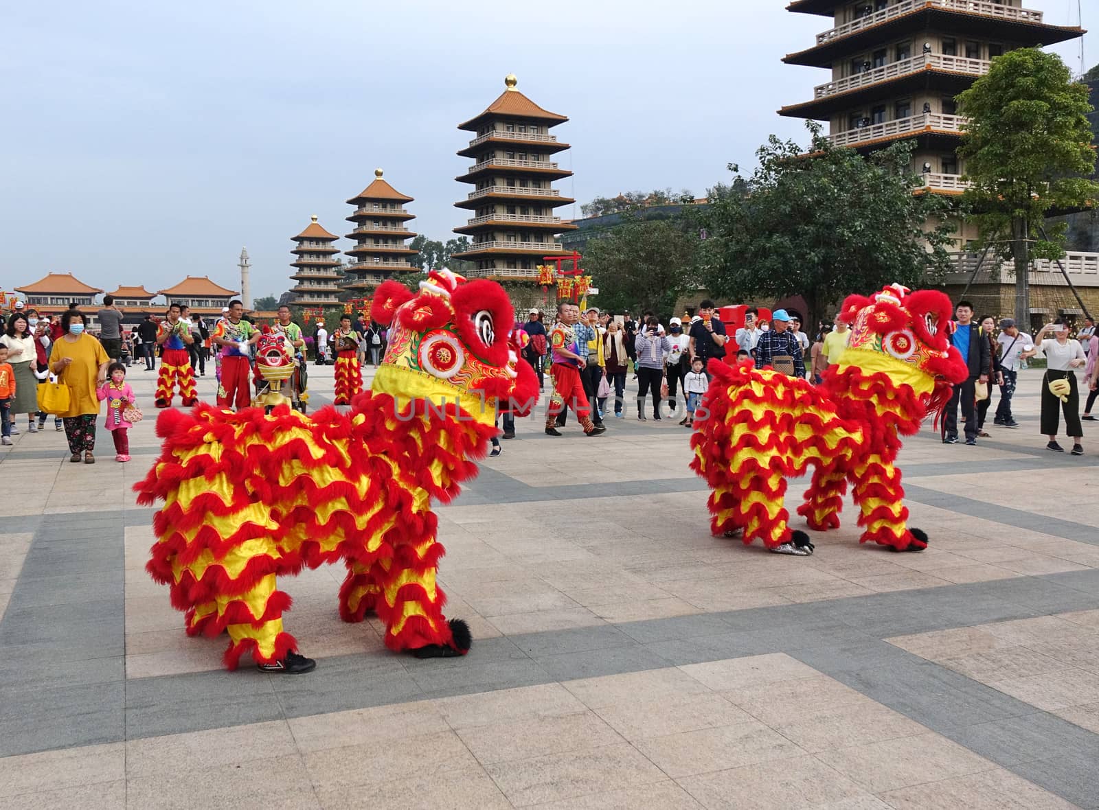 KAOHSIUNG, TAIWAN -- JANUARY 25, 2020: Traditional Chinese Lion dancers perform at the Fo Guang Shan Buddhist complex during Chinese New Year.