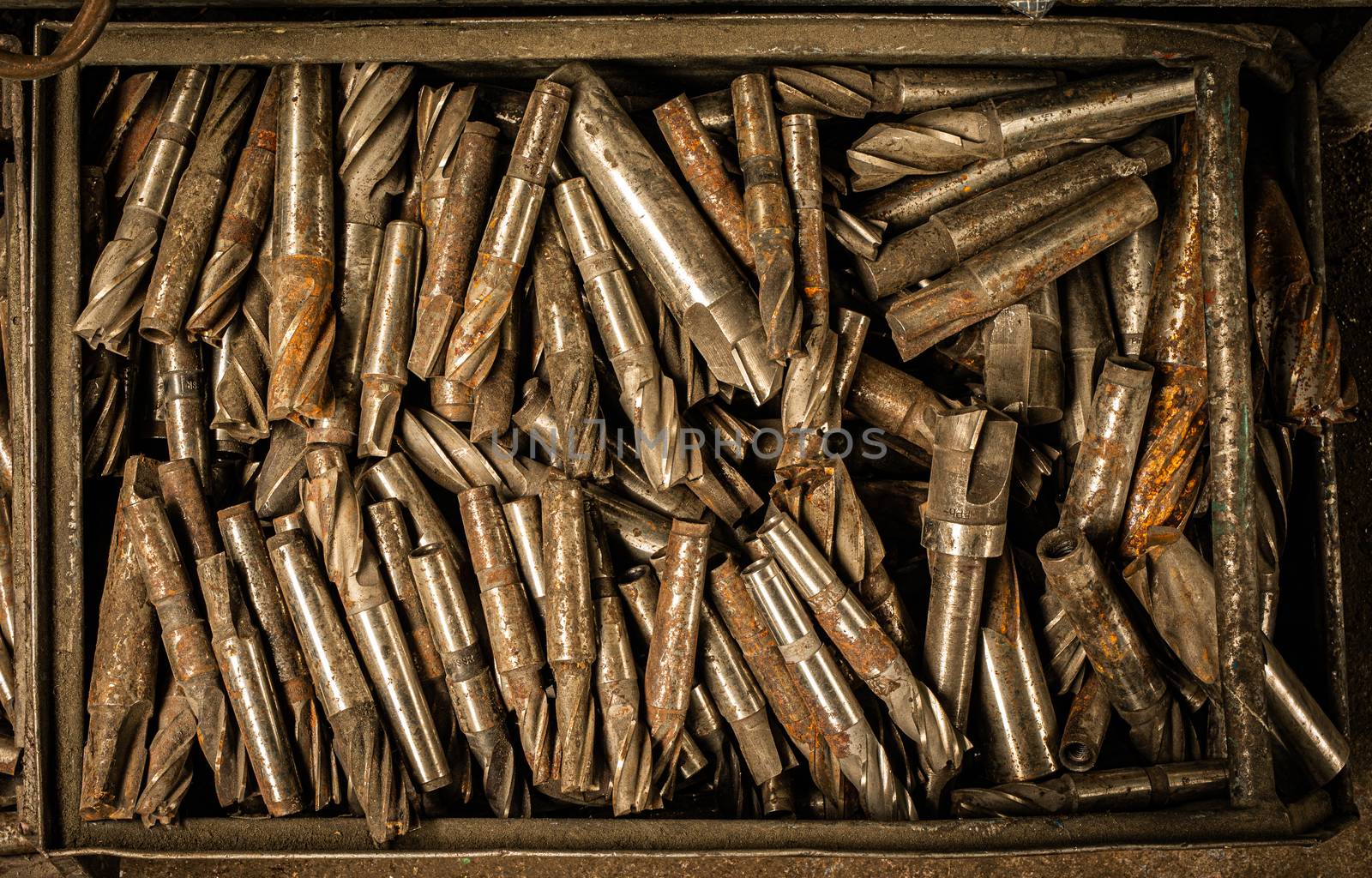 box of rusted iron drills by mkenwoo
