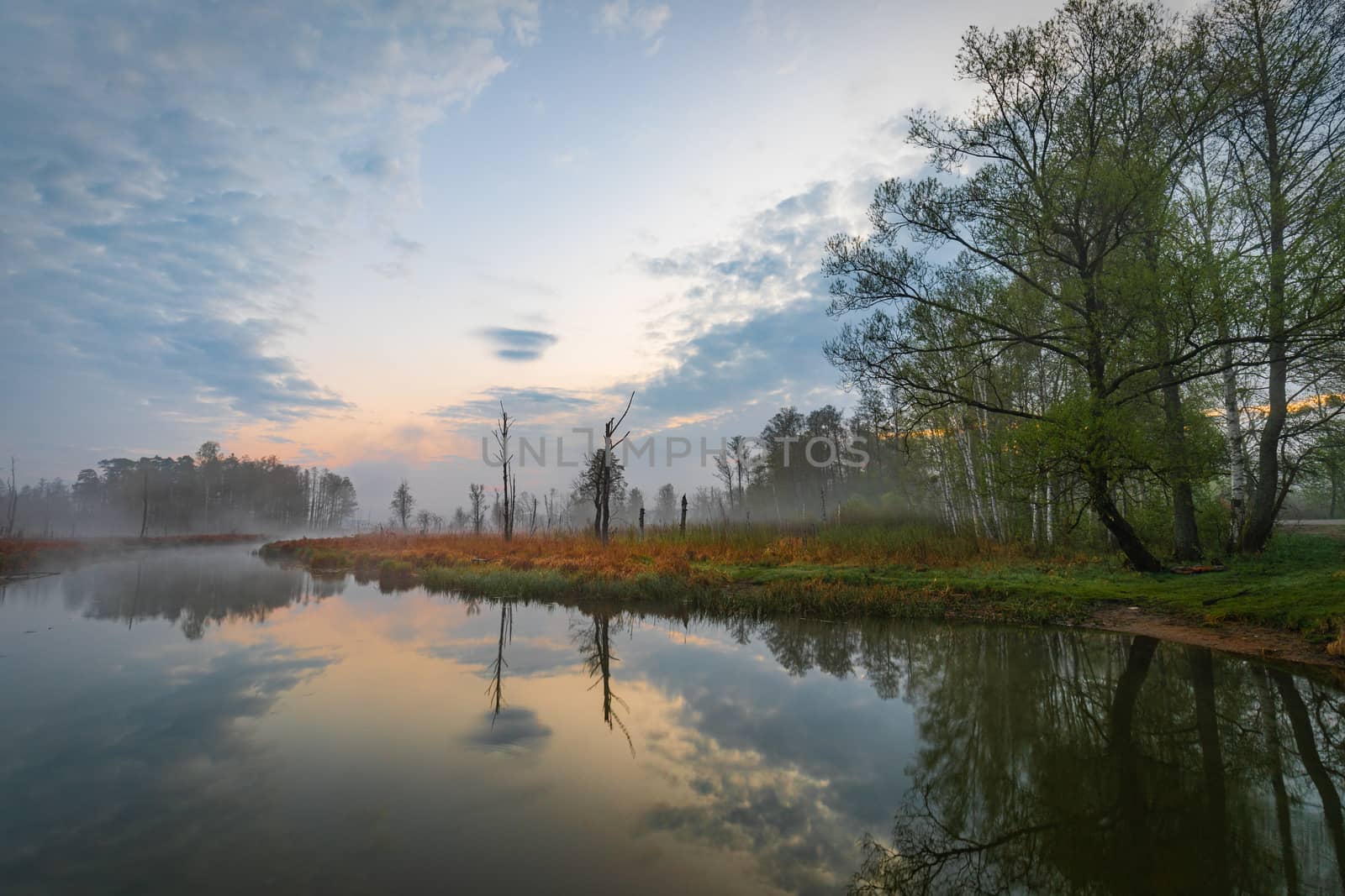 Foggy sunrise over the lake in Mazury region, Poland in impressi by mkenwoo