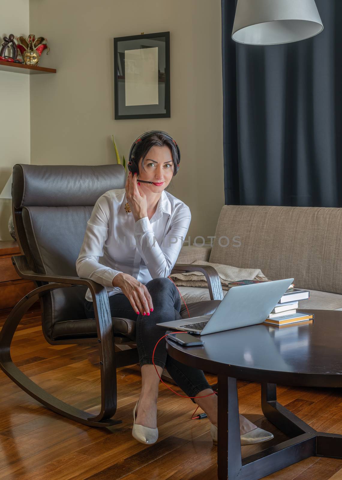 Woman working from home office during corona virus (COVID-19) ou by mkenwoo