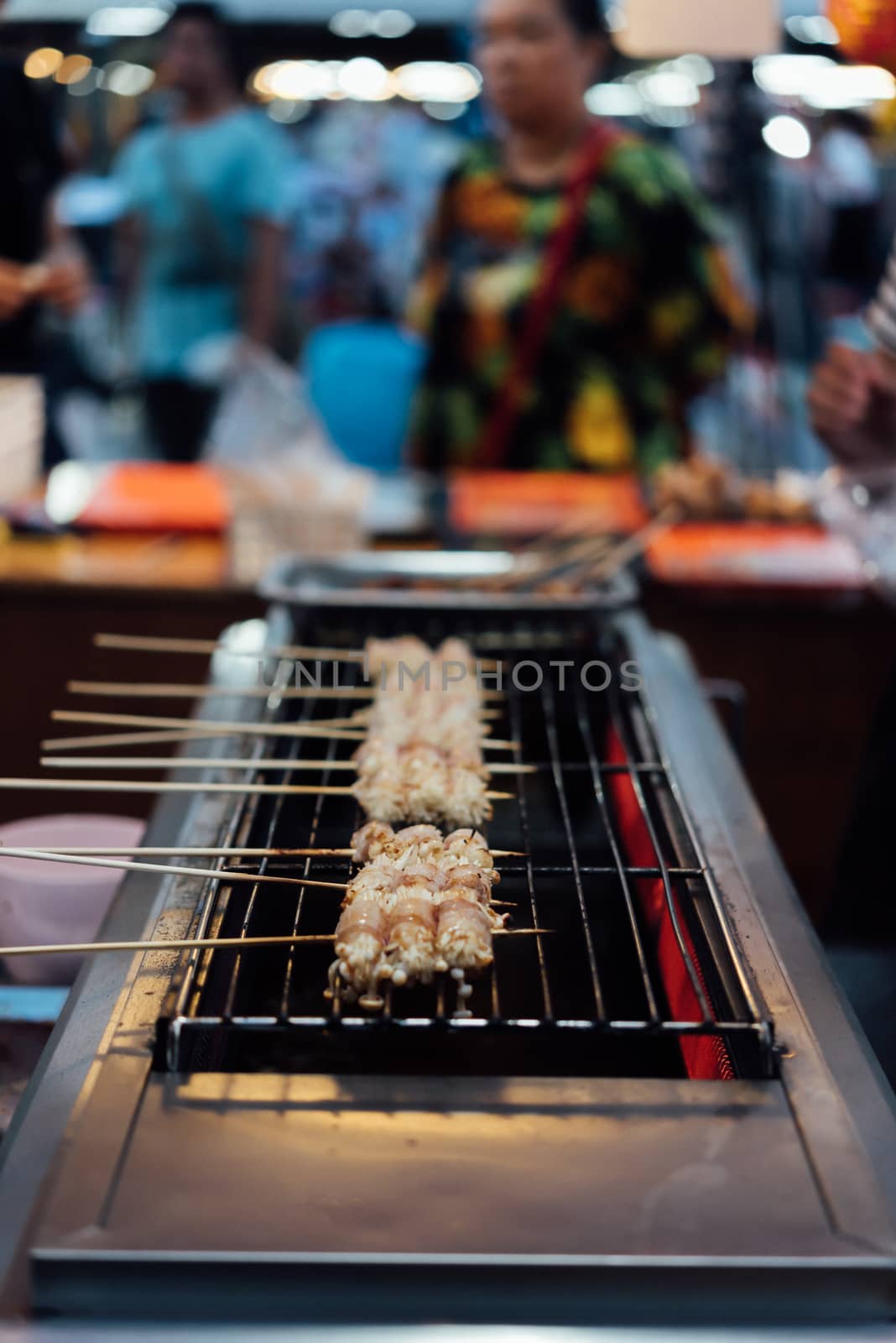 Mala is Grilled meat (Beef, Pork, Chickens or Mushroom) with chilli sauce and chinese hot spicy herb (Sichuan Pepper) for sale at Thai street food market or restaurant in Bangkok Thailand