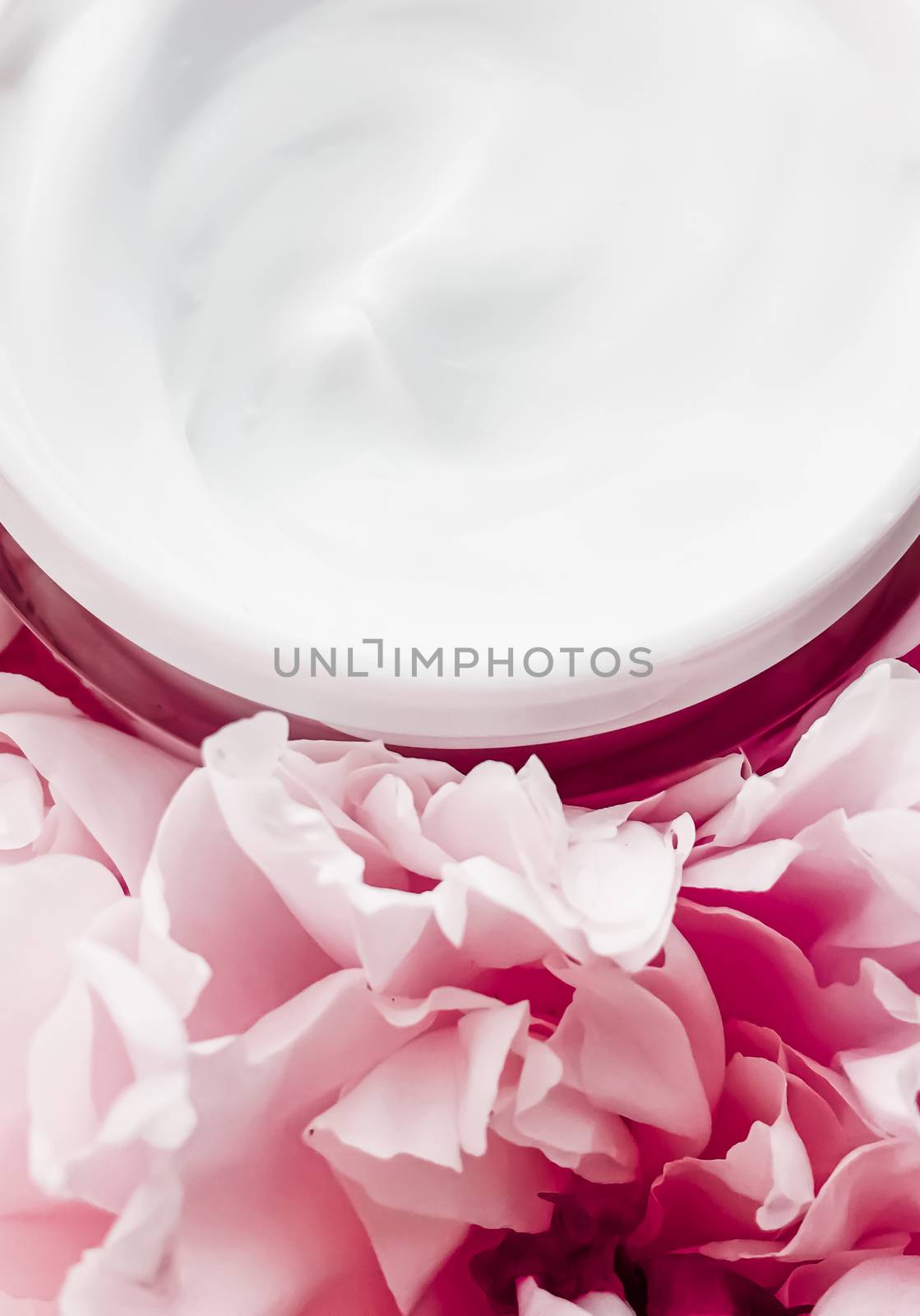 Face cream moisturizer on floral background as luxury skincare cosmetics, healthcare and beauty product concept