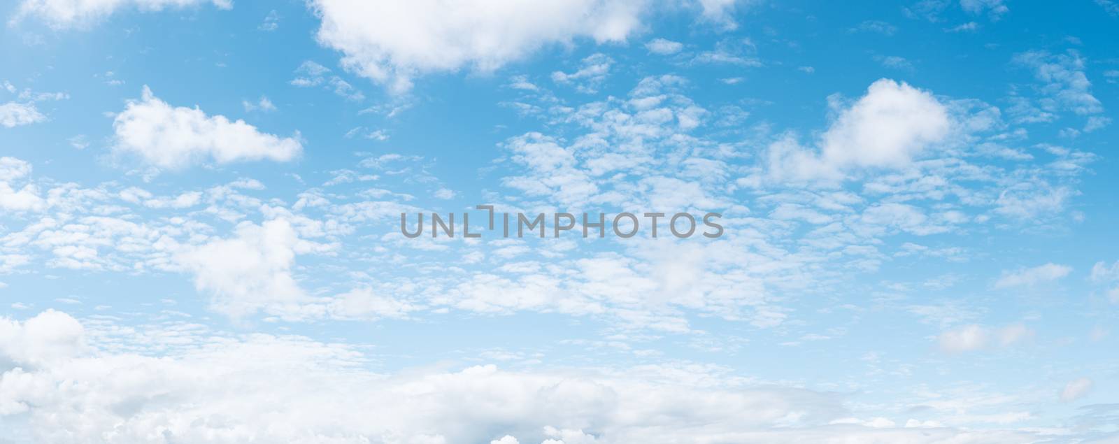 Panoramic blue sky background with white clouds by dutourdumonde