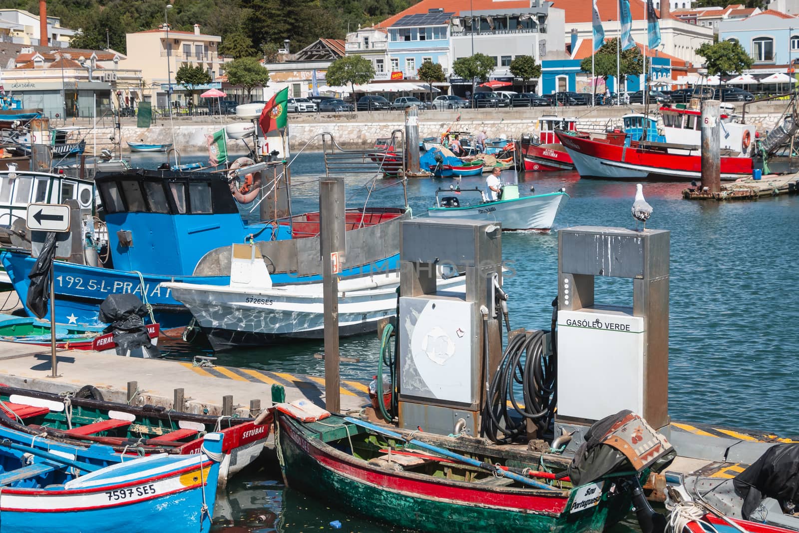 Setubal, Portugal - August 8, 2018: In the fishing harbor on a summer day, a gas station reserved to fishing boats