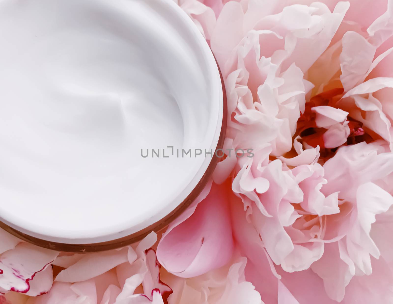 Face cream moisturizer on floral background as luxury skincare cosmetics, healthcare and beauty product by Anneleven