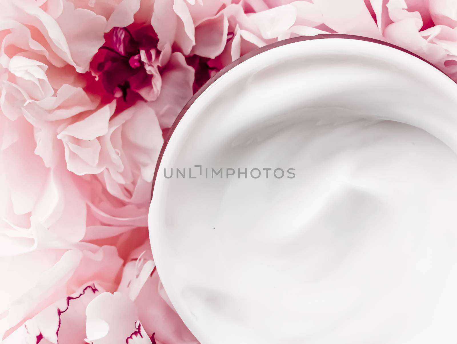 Face cream moisturizer on floral background as luxury skincare cosmetics, healthcare and beauty product by Anneleven