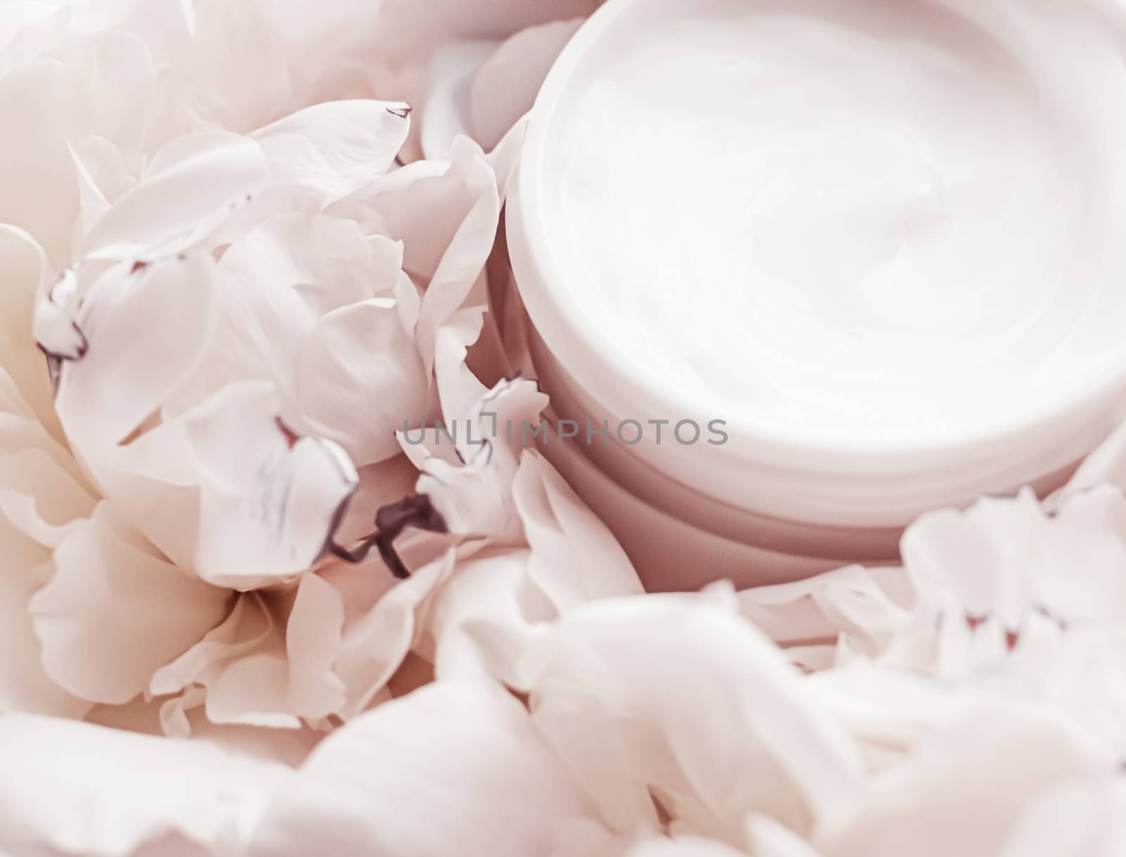 Luxe cosmetic cream jar as antiaging skincare routine product on background of peony flowers, body moisturizer and beauty branding by Anneleven