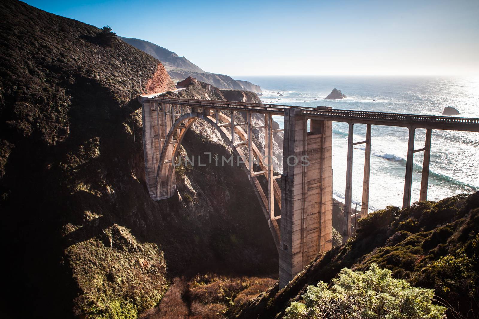 A view of Bixby Bridge out to the Pacific Ocean near Big Sur, California, USA
