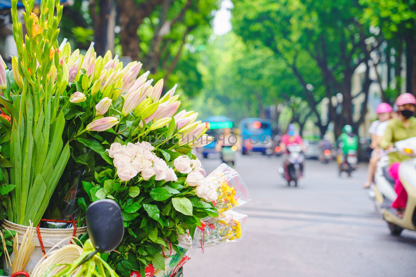 Flower market on bicycle on the road local market in HANOI VIETN by bbbirdz