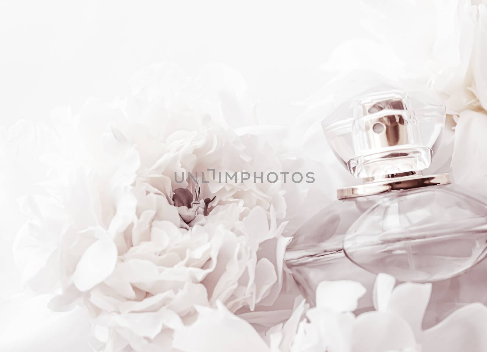 Chic fragrance bottle as luxe perfume product on background of peony flowers, parfum ad and beauty branding by Anneleven