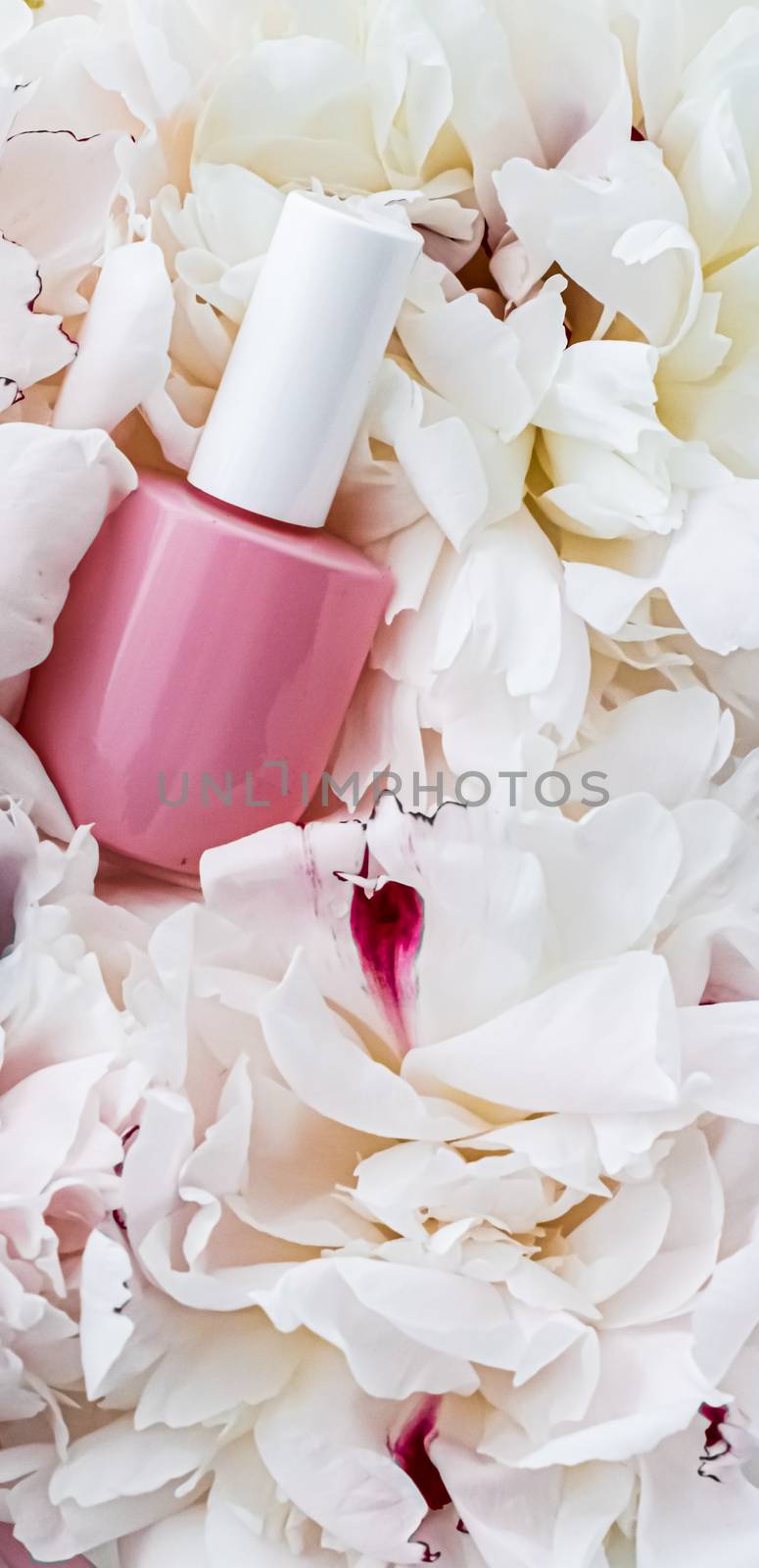 Nail polish bottles on floral background, french manicure and cosmetic branding by Anneleven