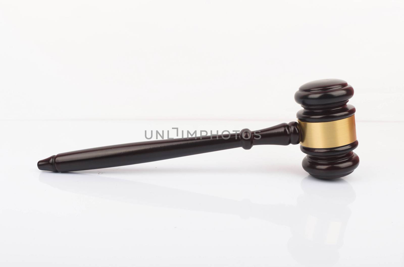 View of a judge hammer or gavel on white background. Law and jurisdiction concept.